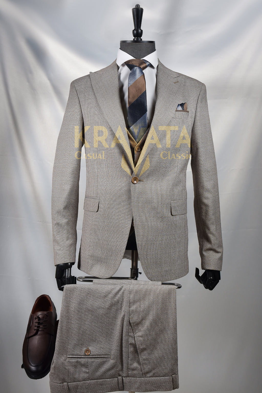 Men's formal suit in gray and brown with a modern design