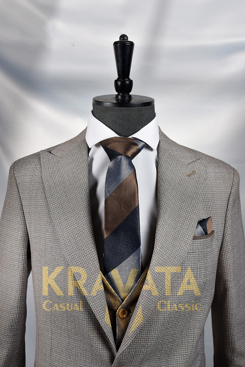 Men's formal suit in gray and brown with a modern design