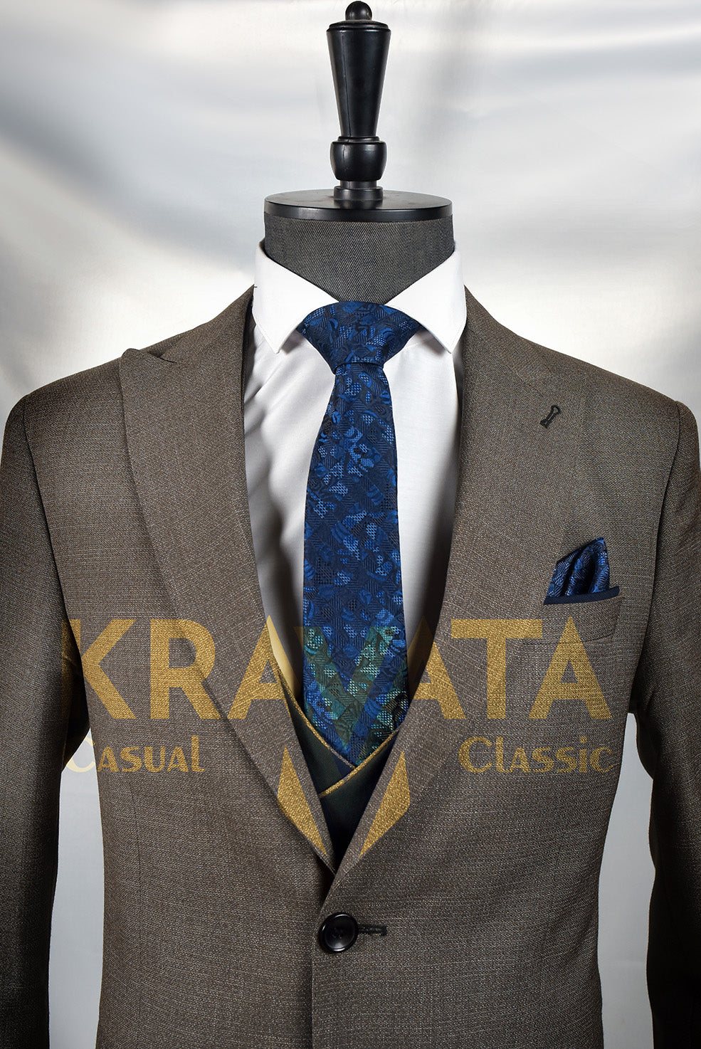 Men's formal suit in brown with a modern design and a blue tie